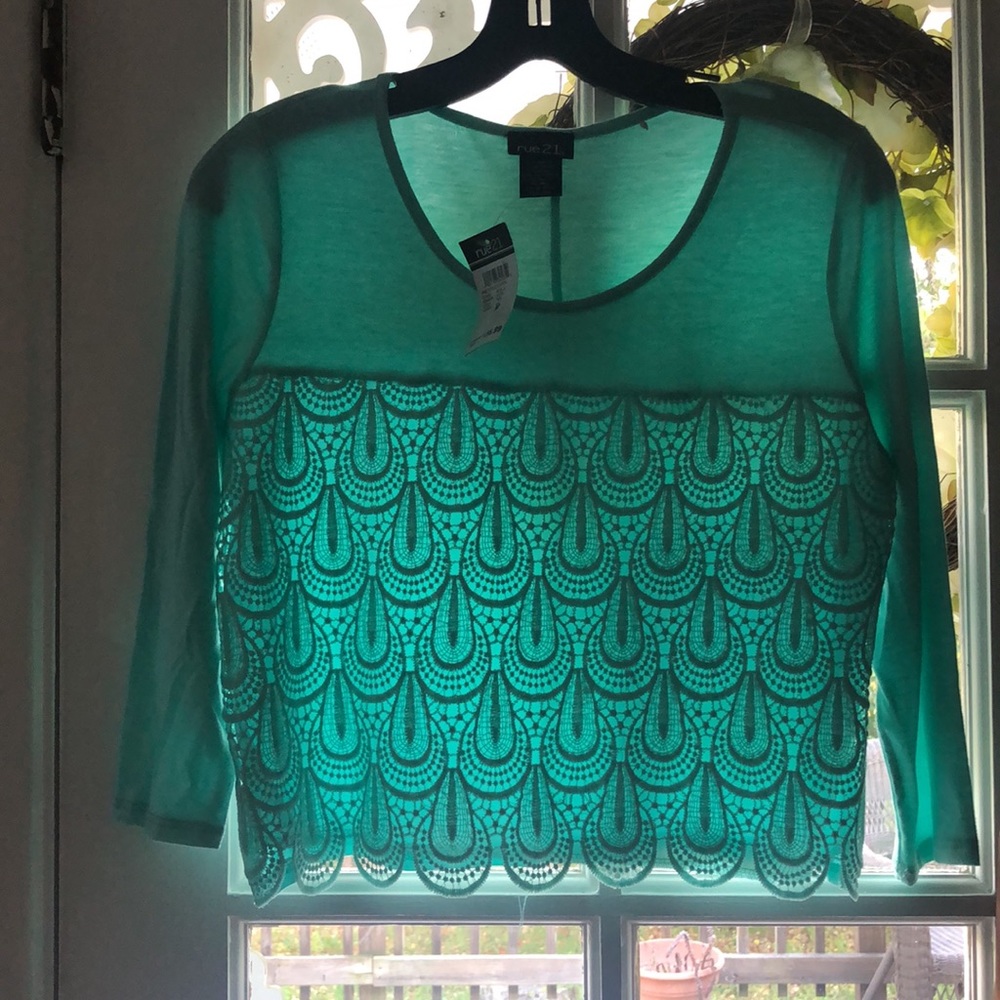NWT Rue 21 Soft crocheted lace overlay top.  Mint green in color. Beautiful